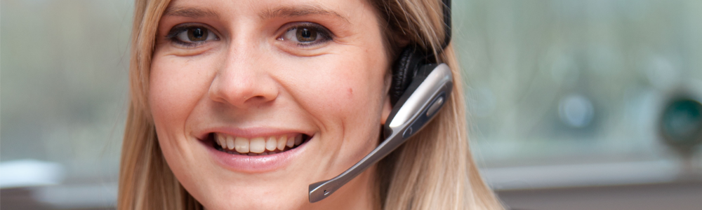 A female with a headset on in the customer services team
