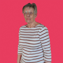 Kath, Customer Feedback Panel member, wearing a red and white stripped t-shirt against a red backdrop.