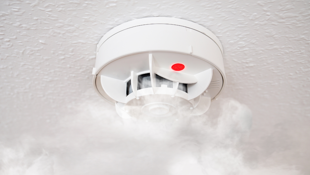 Fire smoke alarm with smoke rising