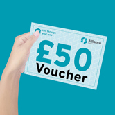 Person holding a £50 voucher